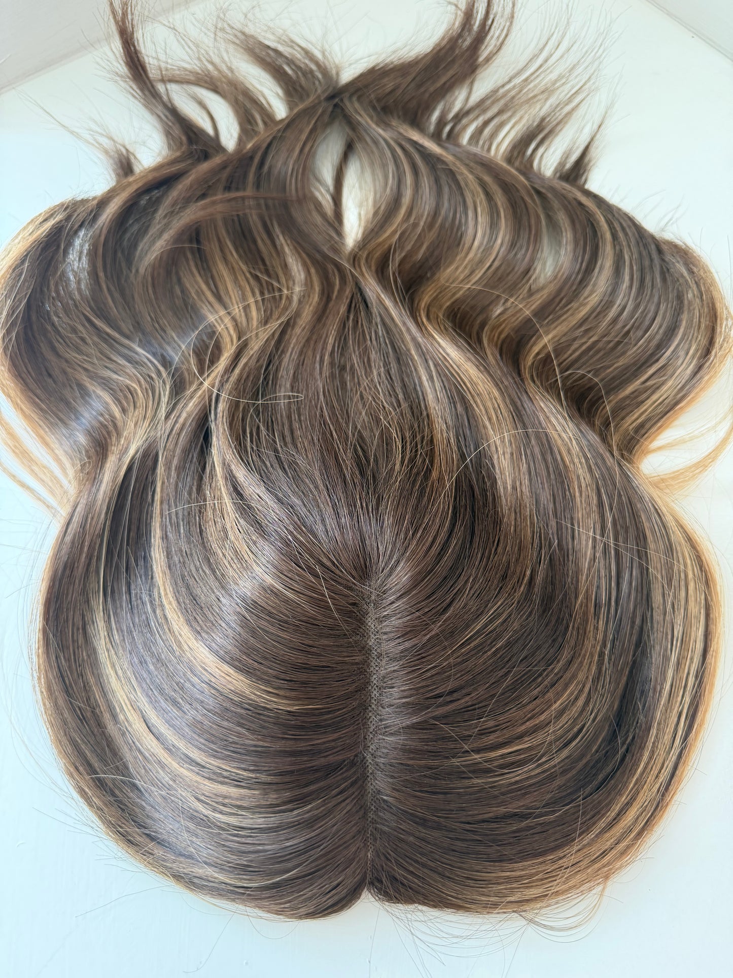 Hazel luxury human hair topper by Tresselle London. Lightweight mono construction for natural volume, effortless wear and a beautifully undetectable finish.