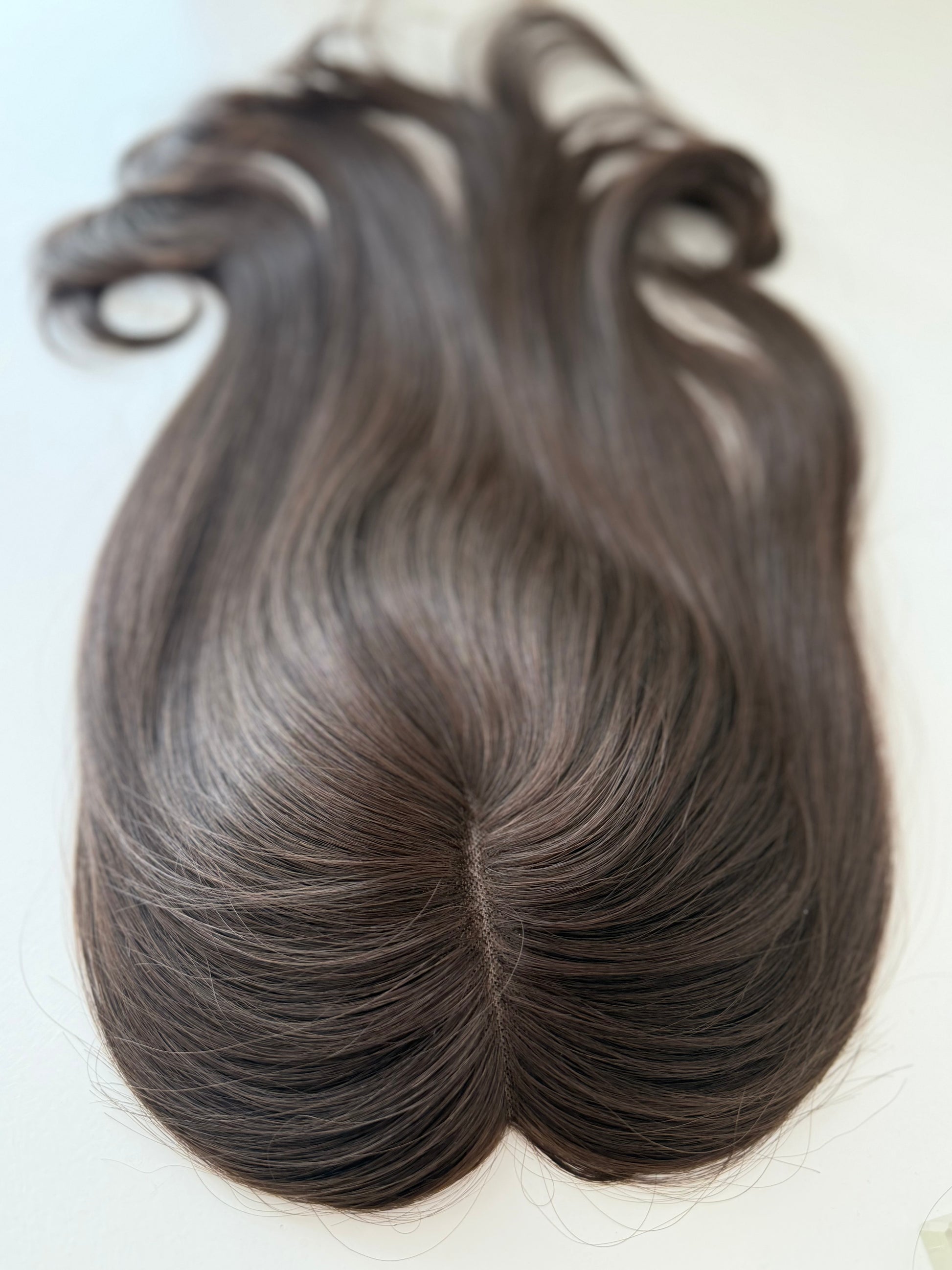 Cocoa luxury human hair mono topper by Tresselle London, designed for effortless volume, lightweight wear and a naturally undetectable finish.