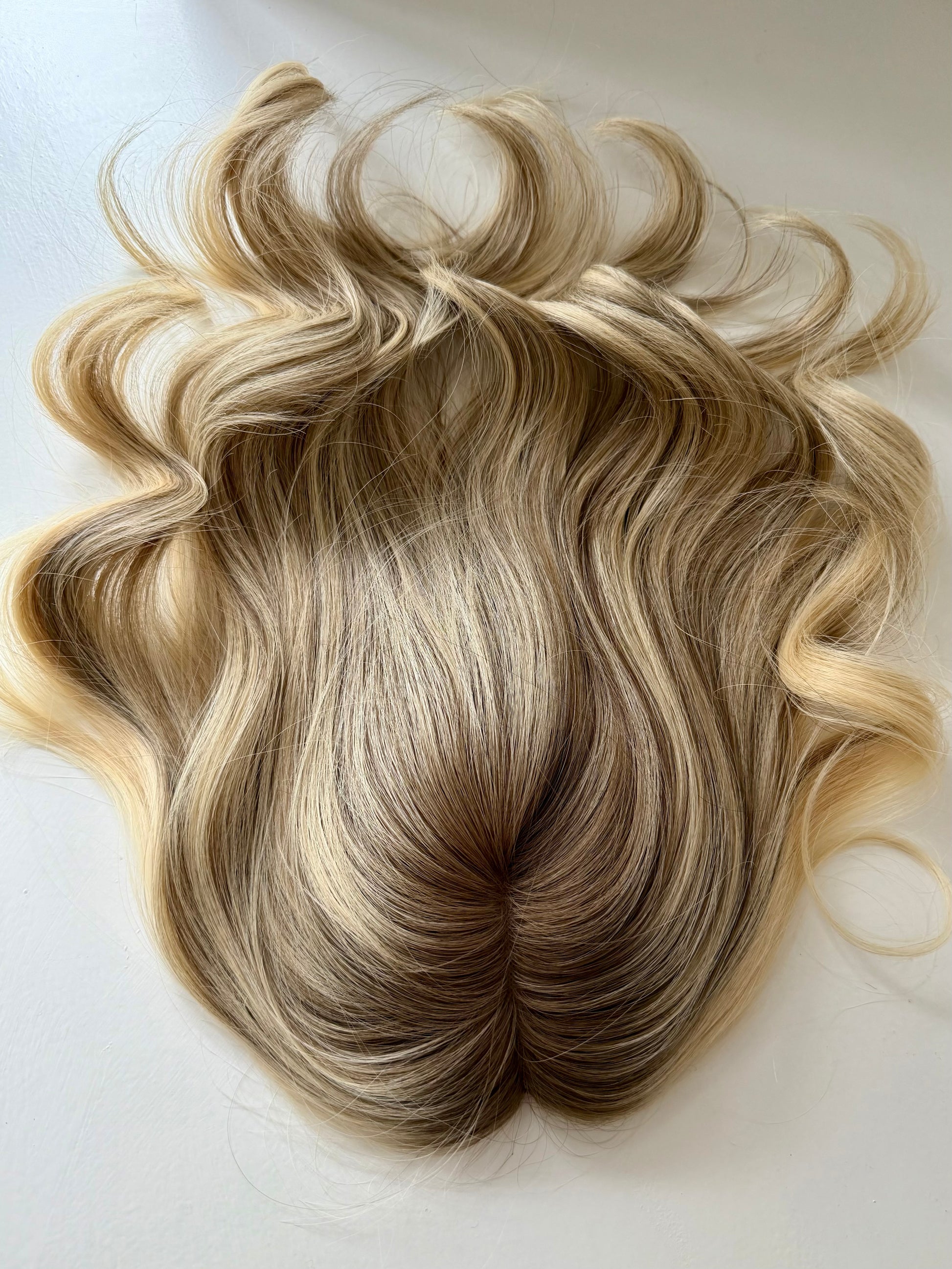 Champagne luxury human hair topper by Tresselle London. 